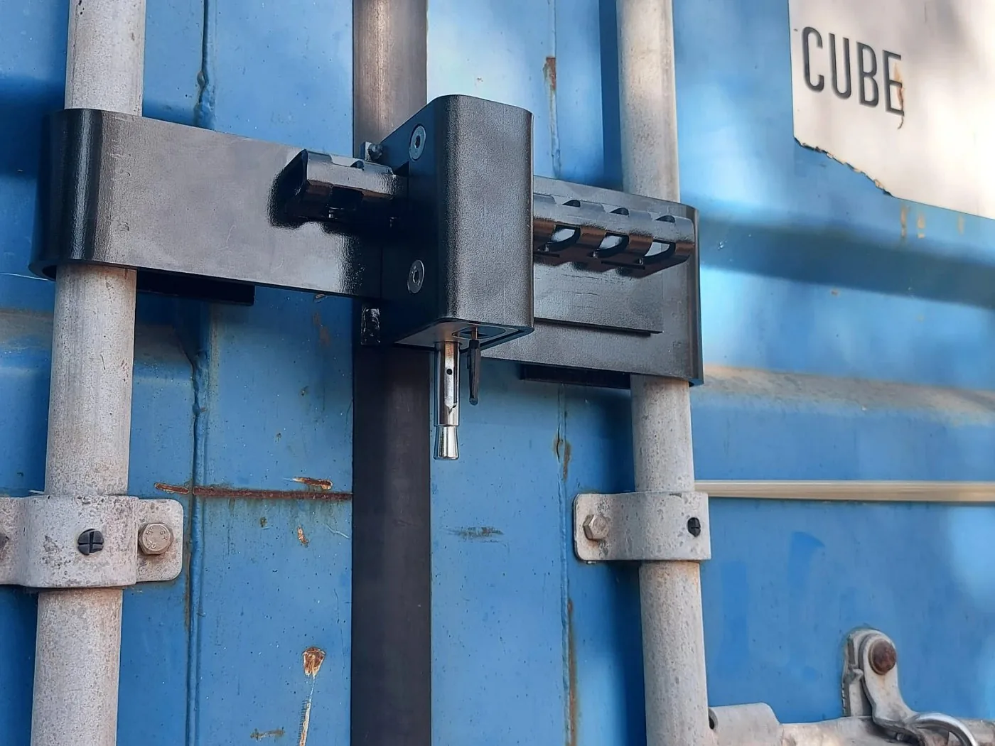 Container Lock fitted over the two locking bars of a container door
